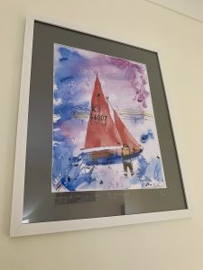 painting of a sailing boat and person