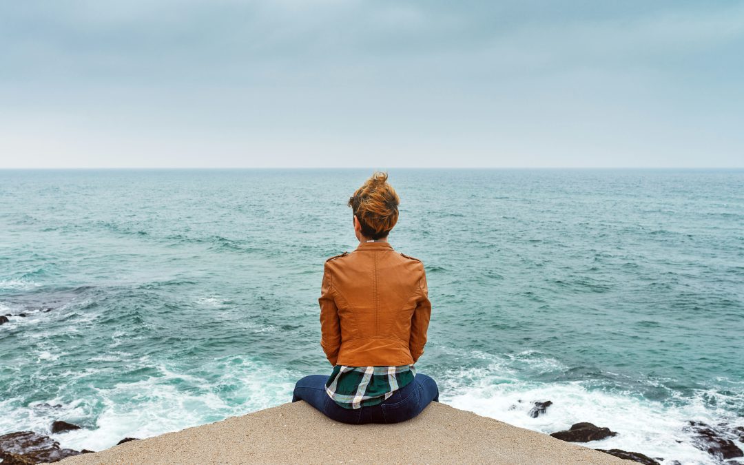 woman looking out to sea